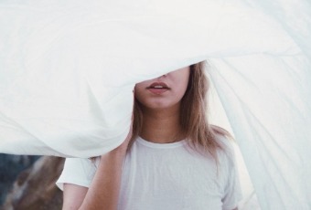 woman with white sheet
